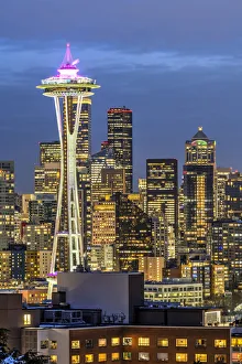 Night view over downtown skyline with the iconic Space Needle in the foreground, Seattle, Washington, USA Night view over downtown skyline with the iconic Space Needle in the foreground, Seattle, Washington, USA
