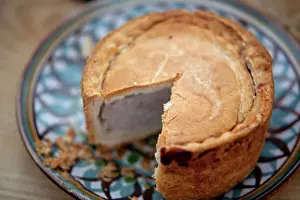 Prints of Nottinghamshire, UK. Melton Mowbray pork pie on handmade ceramic plate Nottinghamshire Prints: Nottinghamshire Print: Melton Mowbray Pork Pie on Handmade Ceramic Plate