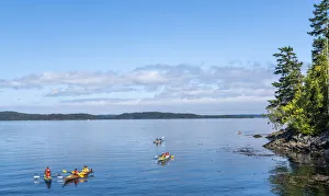 Ocean canoeing in Telegraph Cove, British Columbia, Vancouver Island, Canada Ocean canoeing in Telegraph Cove, British Columbia, Vancouver Island, Canada