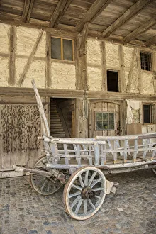 Old cart by a farmhouse, Emmental Valley, Berner Oberland, Switzerland Old cart by a farmhouse, Emmental Valley, Berner Oberland, Switzerland