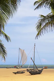 Oruwa (outrigger canoe) on Negombo beach, Western Province, Sri Lanka Oruwa (outrigger canoe) on Negombo beach, Western Province, Sri Lanka