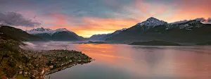 Panoramic of Lake Como and the lakeshore town of Domaso at sunrise, aerial view Panoramic of Lake Como and the lakeshore town of Domaso at sunrise, aerial view