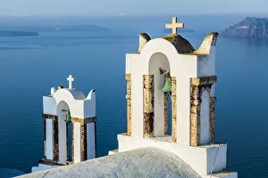Panoramic view from the tiny roads of Oia in the North West of Santorini, Cyclades Panoramic view from the tiny roads of Oia in the North West of Santorini, Cyclades