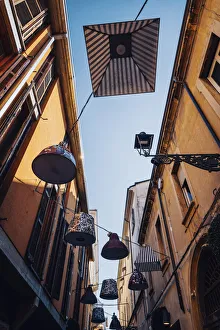 Parma, Illuminations installation with lampshades and buildings, Emilia Romagna, Italy Parma, Illuminations installation with lampshades and buildings, Emilia Romagna, Italy