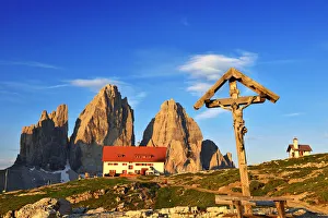 Three Peaks with Three Peaks Lodge and Jesus at the crossroads, Sexten Dolomites Three Peaks with Three Peaks Lodge and Jesus at the crossroads, Sexten Dolomites