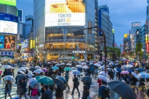 Pedestrians with umbrellas Shibuya Crossing, one of the busiest crossings in the world Pedestrians with umbrellas Shibuya Crossing, one of the busiest crossings in the world