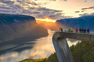 Norway Collection: People photographing sunset on the fjord from Stegastein viewpoint, aerial view
