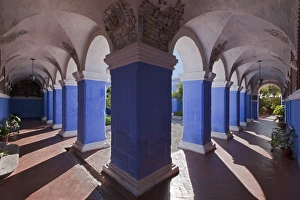 Peru, Vaulted walkways around a courtyard garden in the magnificent Santa Catalina Convent Peru, Vaulted walkways around a courtyard garden in the magnificent Santa Catalina Convent