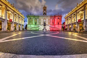 Piazza del Campidoglio with Palazzo Senatorio illuminated with the colors of the Italian Piazza del Campidoglio with Palazzo Senatorio illuminated with the colors of the Italian