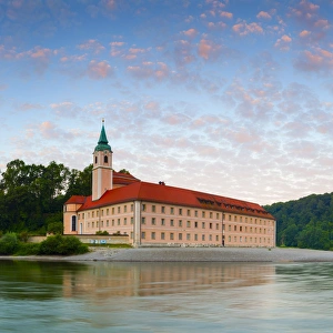 The picturesque Weltenburg Abbey & The River Danube illuminated at sunrise, Lower Bavaria The picturesque Weltenburg Abbey & The River Danube illuminated at sunrise, Lower Bavaria