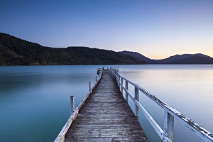 Picturesque wharf illuminated at dusk, Kenepuru Sound, Marlborough Sounds, South Island Picturesque wharf illuminated at dusk, Kenepuru Sound, Marlborough Sounds, South Island
