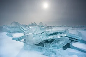 Pieces of ice with sun reflection at lake Baikal, Irkutsk region, Siberia, Russia Pieces of ice with sun reflection at lake Baikal, Irkutsk region, Siberia, Russia