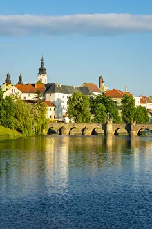 Pisek Stone bridge over Otava River with Pisek Castle in background, Pisek, South Bohemian Region, Czech Republic Pisek Stone bridge over Otava River with Pisek Castle in background, Pisek, South Bohemian Region, Czech Republic