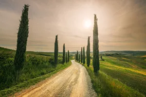 Podere Baccoleno in spring during a hazy afternoon, Crete Senesi, Tuscany, Italy Podere Baccoleno in spring during a hazy afternoon, Crete Senesi, Tuscany, Italy