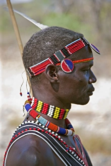 A Pokot man wearing typical beaded ornaments of his tribe A Pokot man wearing typical beaded ornaments of his tribe