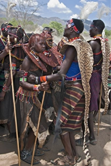 Pokot men, women and girls dancing to celebrate an Atelo ceremony Pokot men, women and girls dancing to celebrate an Atelo ceremony