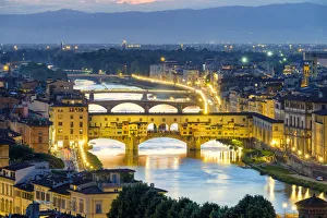 Ponte Vecchio on the Arno river and buildings in the old town at night, Florence Ponte Vecchio on the Arno river and buildings in the old town at night, Florence