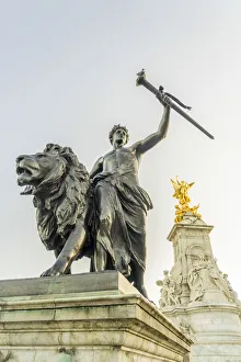 Prometheus or Progress statue and the Victorial Memorial outside Buckingham Palace Prometheus or Progress statue and the Victorial Memorial outside Buckingham Palace