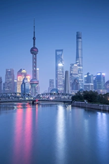Pudong skyline across the Suzhou Creek and Waibaidu bridge, Shanghai, China Pudong skyline across the Suzhou Creek and Waibaidu bridge, Shanghai, China