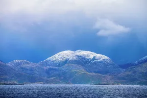 Latin America Coastal Landscapes Prints: Brooding clouds over the isalnds in the Strait, Strait of Magellan, Patagonia, Chile