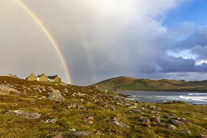 A rainbow sits above an old house in western Achill Island, , Achill Island, County Mayo A rainbow sits above an old house in western Achill Island, , Achill Island, County Mayo