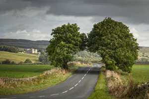 Road leading to Bolton Castle in Wensleydale, Yorkshire Dales National Park Road leading to Bolton Castle in Wensleydale, Yorkshire Dales National Park