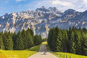 The road leading to SchwAA¤galp pass with mount SAA¤ntis in the background, Switzerland The road leading to SchwAA¤galp pass with mount SAA¤ntis in the background, Switzerland