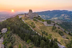 The Rocca Maggiore of Assisi at sunset. Assisi, Perugia province, Umbria, Italy, Europe The Rocca Maggiore of Assisi at sunset. Assisi, Perugia province, Umbria, Italy, Europe