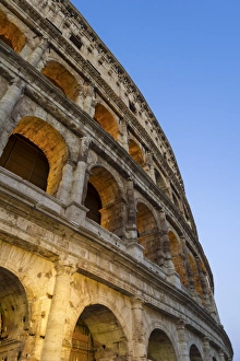 Rome, Lazio, Italy. Colosseum at summer sunrise Rome, Lazio, Italy. Colosseum at summer sunrise