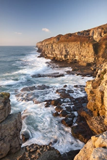 Rough seas crashing around the rocks at Winspit on the Isle of Purbeck, Dorset, England Rough seas crashing around the rocks at Winspit on the Isle of Purbeck, Dorset, England
