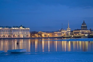 Russia, St. Petersburg; The partly frozen Neva River in Winter, with the Winter Palace Russia, St. Petersburg; The partly frozen Neva River in Winter, with the Winter Palace