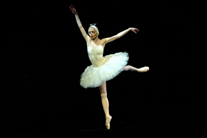 Russia, St. Petersburg; The Prima Ballerina playing the Swan Princess Odette during a solo in Tchaikovsky's Russia, St. Petersburg; The Prima Ballerina playing the Swan Princess Odette during a solo in Tchaikovsky's