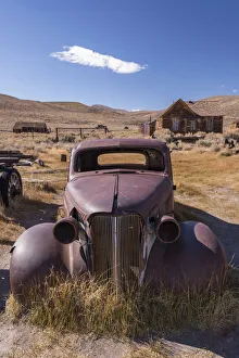 Rusty abandoned old car in Bodie Ghost Town, California, USA. Autumn Rusty abandoned old car in Bodie Ghost Town, California, USA. Autumn