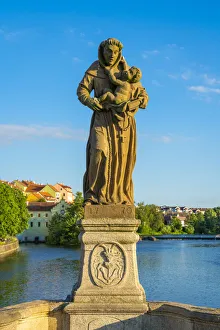 Saint Anthony of Padua sculpture on Pisek Stone Bridge which is the oldest stone bridge in the Czech Republic, Pisek Saint Anthony of Padua sculpture on Pisek Stone Bridge which is the oldest stone bridge in the Czech Republic, Pisek
