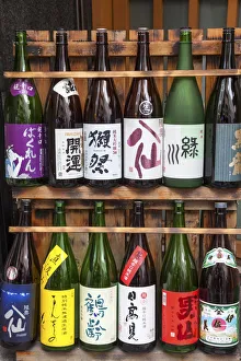 Sake bottles outside a restaurant in Tokyo, Japan Sake bottles outside a restaurant in Tokyo, Japan