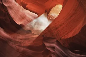 Sandstone erosion landscape with sunbeam in Lower Antelope Canyon - USA, Arizona Sandstone erosion landscape with sunbeam in Lower Antelope Canyon - USA, Arizona