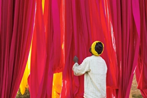 Sari Factory, Textiles dried in the open air, The textiles are hung to dry on bamboo rods Sari Factory, Textiles dried in the open air, The textiles are hung to dry on bamboo rods