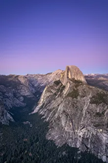 Scenic view of Half Dome granite rock formation at Yosemite National Park after sunset Scenic view of Half Dome granite rock formation at Yosemite National Park after sunset