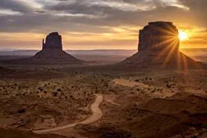 Scenic view of The Mittens at sunrise, Monument Valley, Arizona, USA Scenic view of The Mittens at sunrise, Monument Valley, Arizona, USA