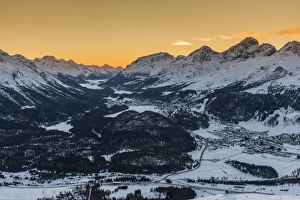 Scenic winter sunset view over Upper Engadine valley from Muottas Muragl with Celerina Scenic winter sunset view over Upper Engadine valley from Muottas Muragl with Celerina