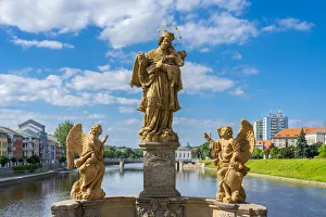 Sculptures on Pisek Stone Bridge which is the oldest stone bridge in the Czech Republic, Pisek, South Bohemian Region Sculptures on Pisek Stone Bridge which is the oldest stone bridge in the Czech Republic, Pisek, South Bohemian Region
