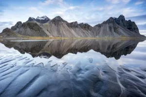 Prints of The mountains reflect on the surface of the ocean. Stokksnes, Eastern Iceland, Europe Iceland Prints: Icelandic Landscape Print
