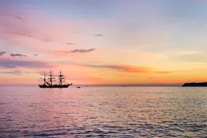 Silhouette of sailing ship at sunset off the coast of Cassis, Bouches-du-RhA´ne Silhouette of sailing ship at sunset off the coast of Cassis, Bouches-du-RhA´ne