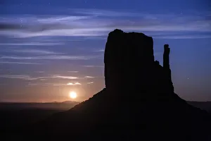 Silhouette of West Mitten Butte at moonrise, Monument Valley, Arizona, USA Silhouette of West Mitten Butte at moonrise, Monument Valley, Arizona, USA