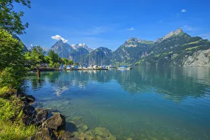 Sisikon sailboat harbor with Vierwaldstatter lake, Sisikon, Canton Uri, Switzerland Sisikon sailboat harbor with Vierwaldstatter lake, Sisikon, Canton Uri, Switzerland