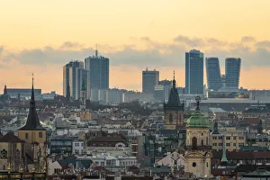 Skyline with high-rise buildings in contrast with old buildings in city center of Prague at sunrise, Prague, Bohemia Skyline with high-rise buildings in contrast with old buildings in city center of Prague at sunrise, Prague, Bohemia