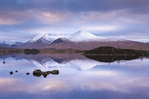 Snow Covered Black Mount reflected in a lochan, Rannoch Moor, Highland, Scotland Snow Covered Black Mount reflected in a lochan, Rannoch Moor, Highland, Scotland