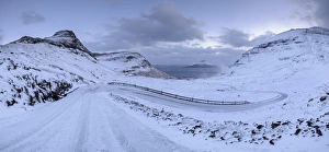 Snow covered mountain road on the Island of Streymoy, Faroe Islands, Denmark, Europe Snow covered mountain road on the Island of Streymoy, Faroe Islands, Denmark, Europe