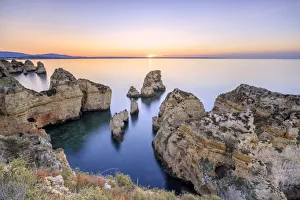 Soft colors of dawn on the cliffs of Ponta da Piedade Lagos Algarve Portugal Europe Soft colors of dawn on the cliffs of Ponta da Piedade Lagos Algarve Portugal Europe