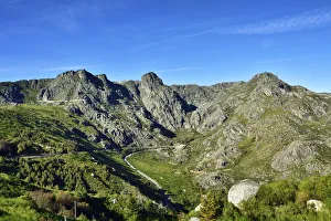 The source of the Zezere river. Covao da Ametade and the three peaks from where flows The source of the Zezere river. Covao da Ametade and the three peaks from where flows